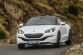 foto: Peugeot RCZ R Carlos Sainz curva [1280x768].jpg