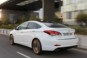 foto: Hyundai i40 Sedan 2015 Exterior trasera dinamica 1 [1280x768].jpg