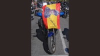 foto: 06 Homenaje Angel Nieto Madrid moto bandera.jpg